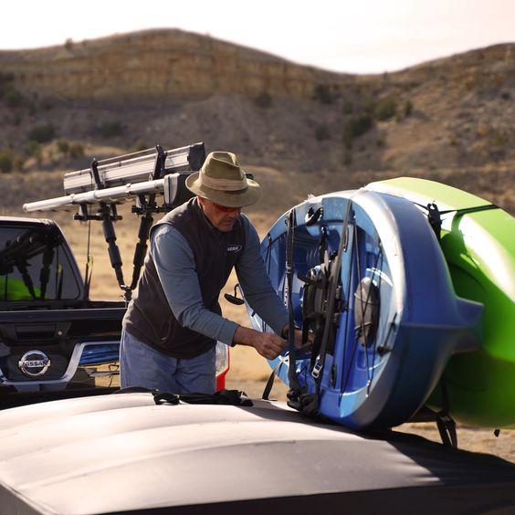 Marty William (CEO) attaching gear to the LittleGiant Camper