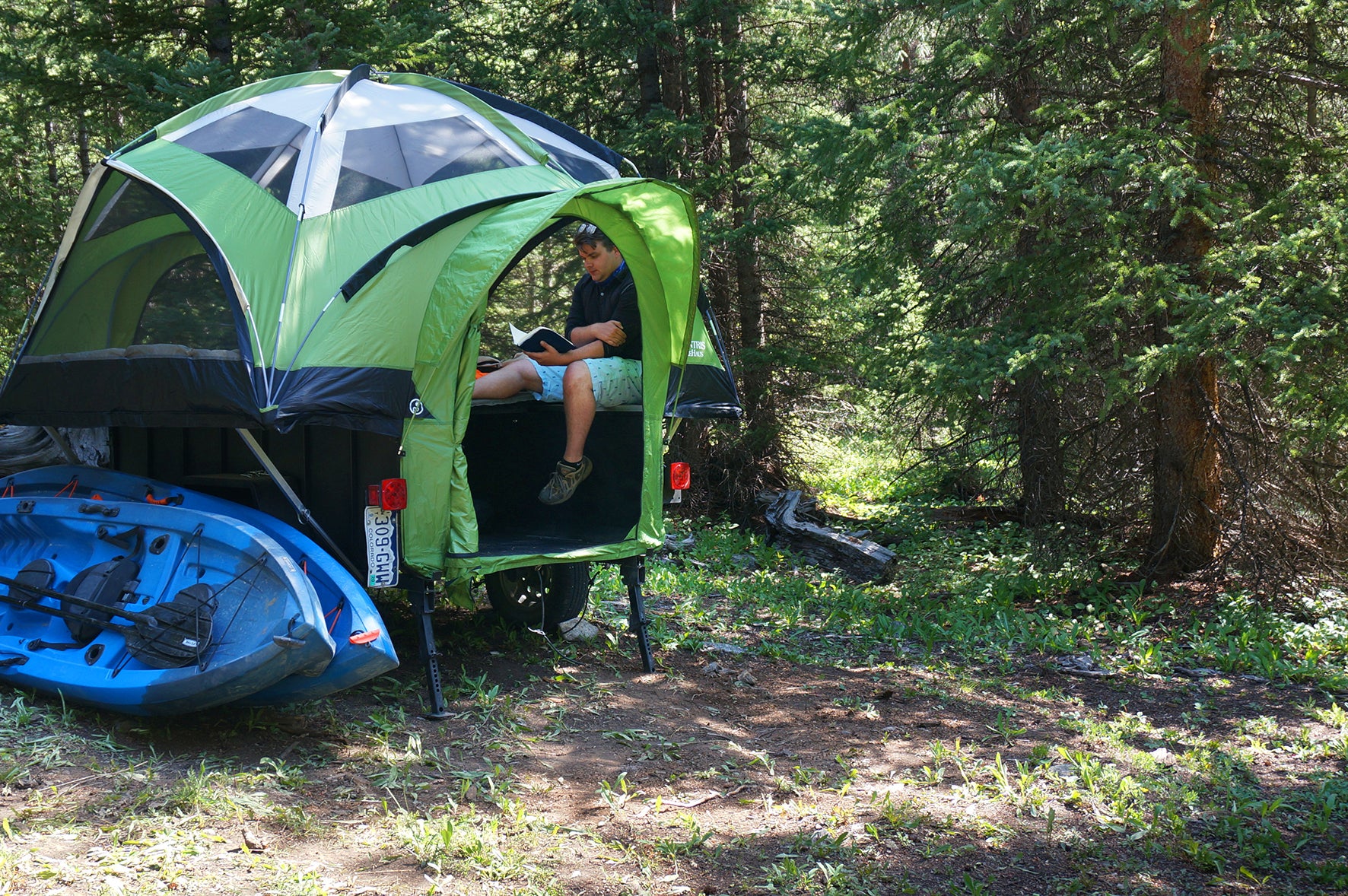 Treehaus Camper with Kayaks Overlanding